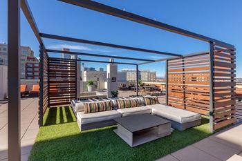 Rooftop terrace with mountain and city views
